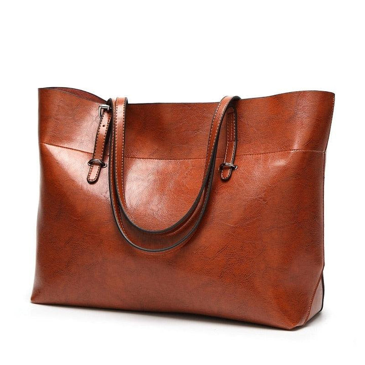 Bolsa Saco Eva Grande de Couro Feminina Vintage - storemundobeauty